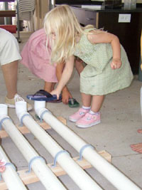 Annaliese Plays Pipes